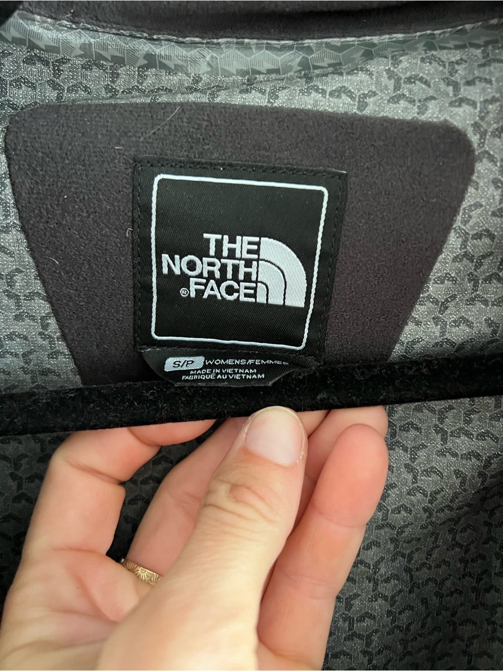 The North Face black rain jacket